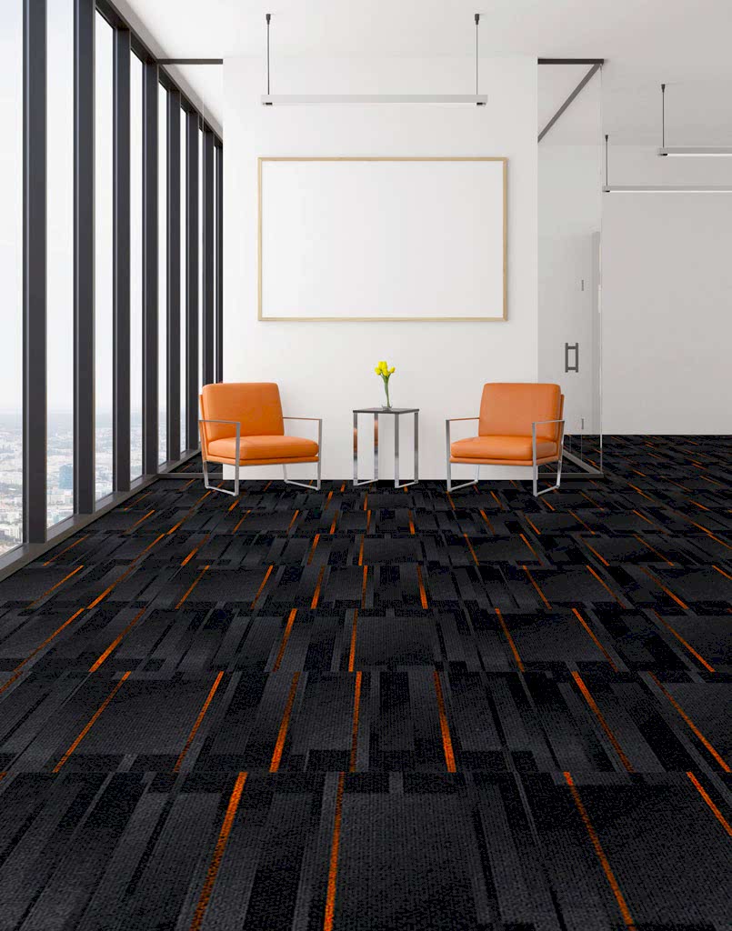 Antrasit desenli karo halı Pasteur 15 zemini olduğundan daha uzun gösterir.